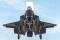 RAF Sqd. Ldr. Jim Schofield persforms STOVL operations in F-35B BF-5 aboard the USS Wasp.